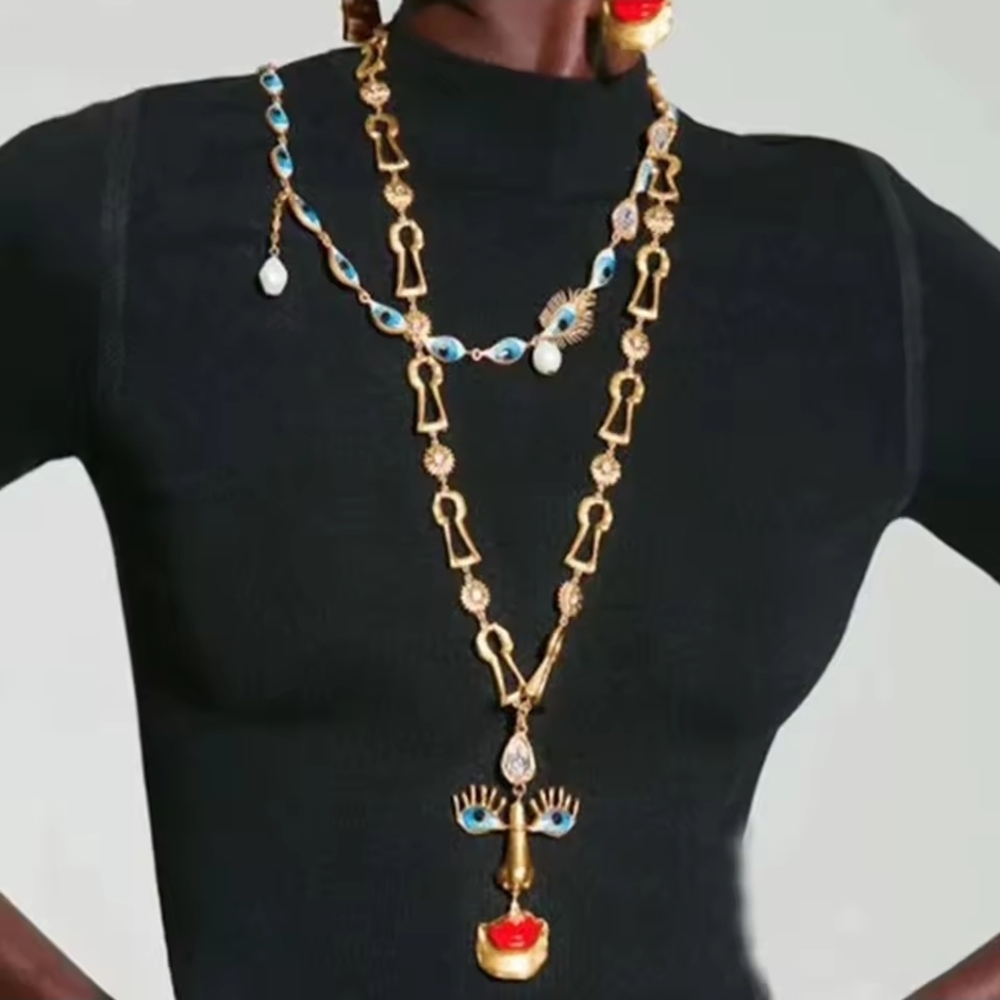 Gold-tone Abstract Face Pendant Necklace with Red Lips - Picture 5 of 5